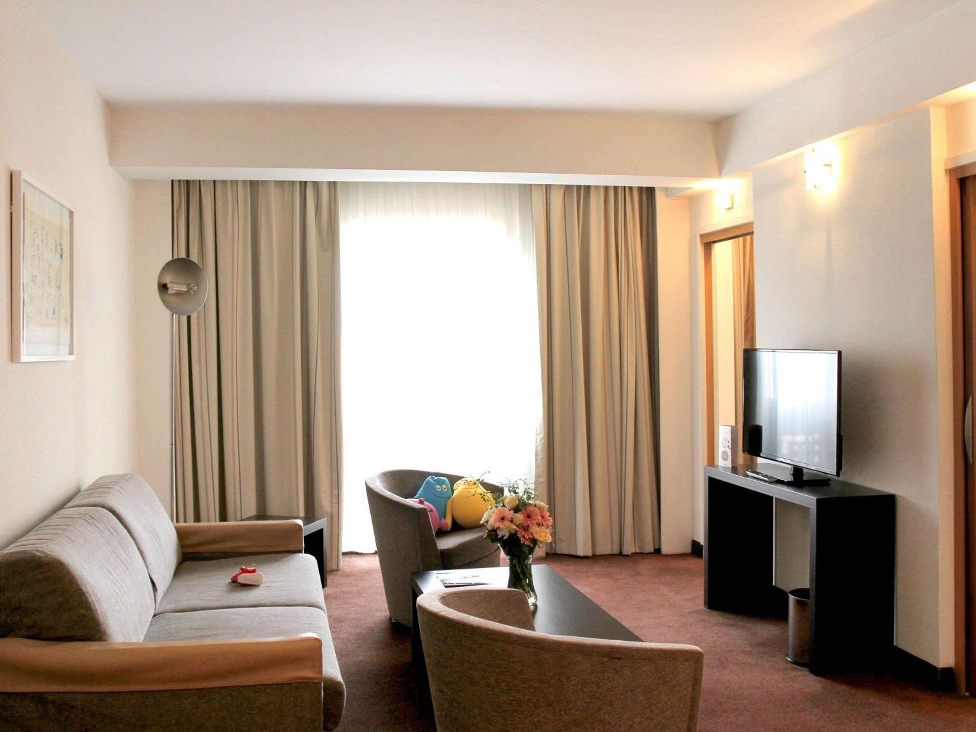 Chambre Executive avec 1 lit king-size et 1 canapé